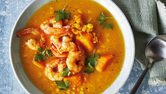 Bowl of prawn, pumpkin and corn chowder